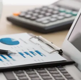 Image of calculator and a pen.